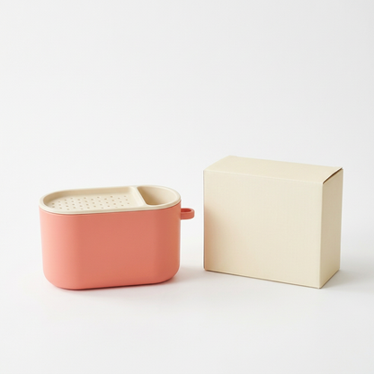 Coral & Cream Countertop Sink Caddy with Divided Storage and a Rounded Everyday Kitchen Design